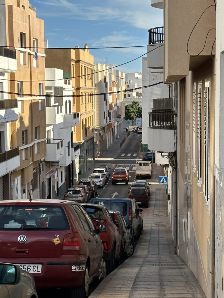 Sunlit residential street in the Canaries